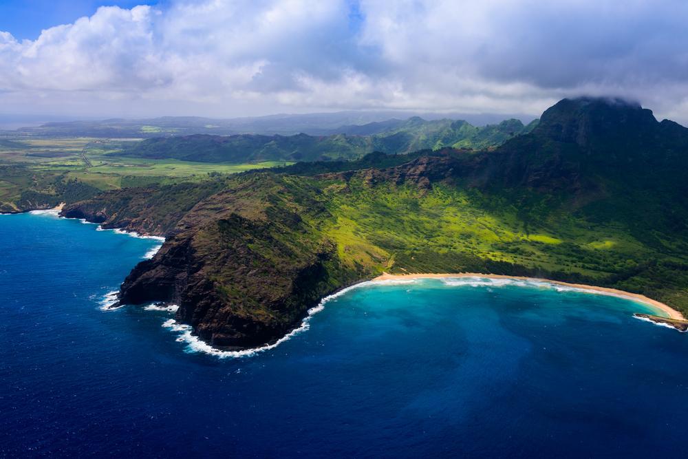 Hike lush trails and admire waterfalls on an affordable island escape.