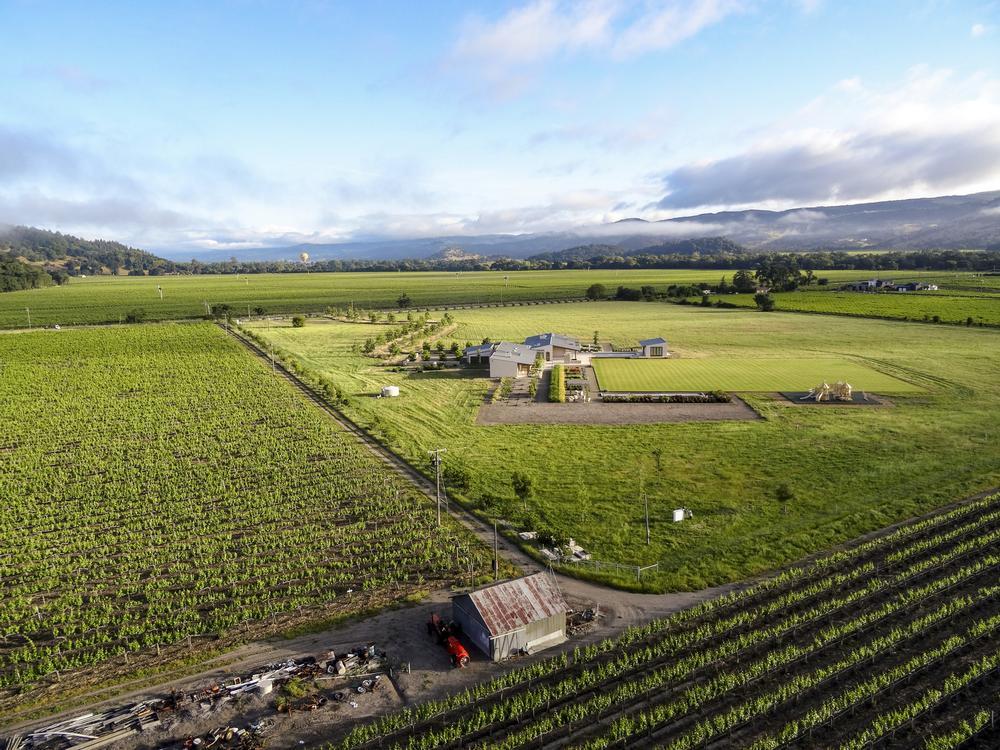 Savor fine dining and stroll vineyard lanes on a luxurious summer retreat.
