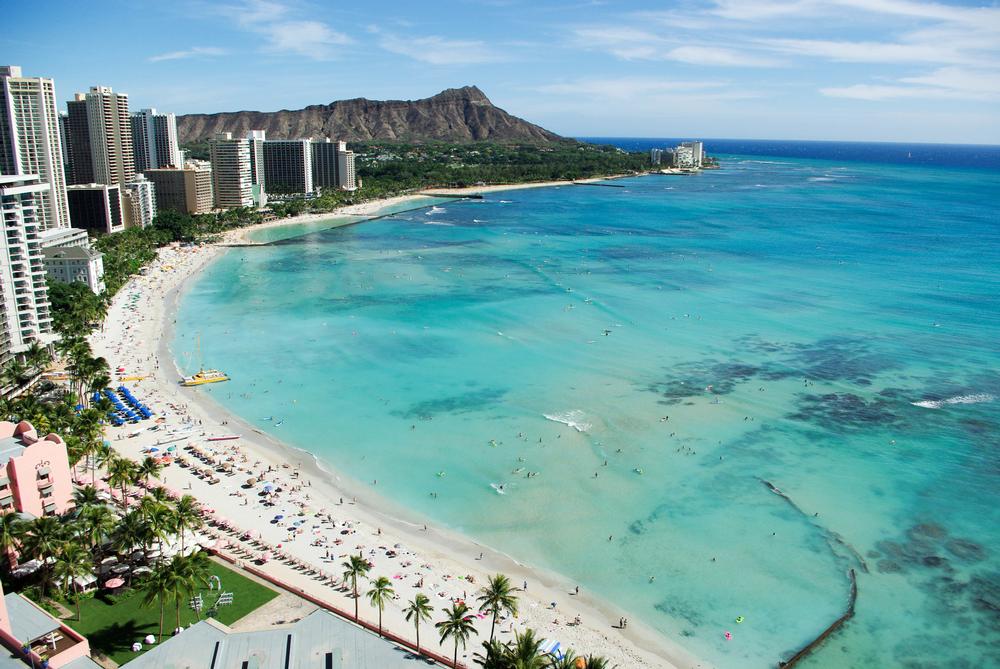 Surf warm waves and visit Pearl Harbor on a fun spring vacation.