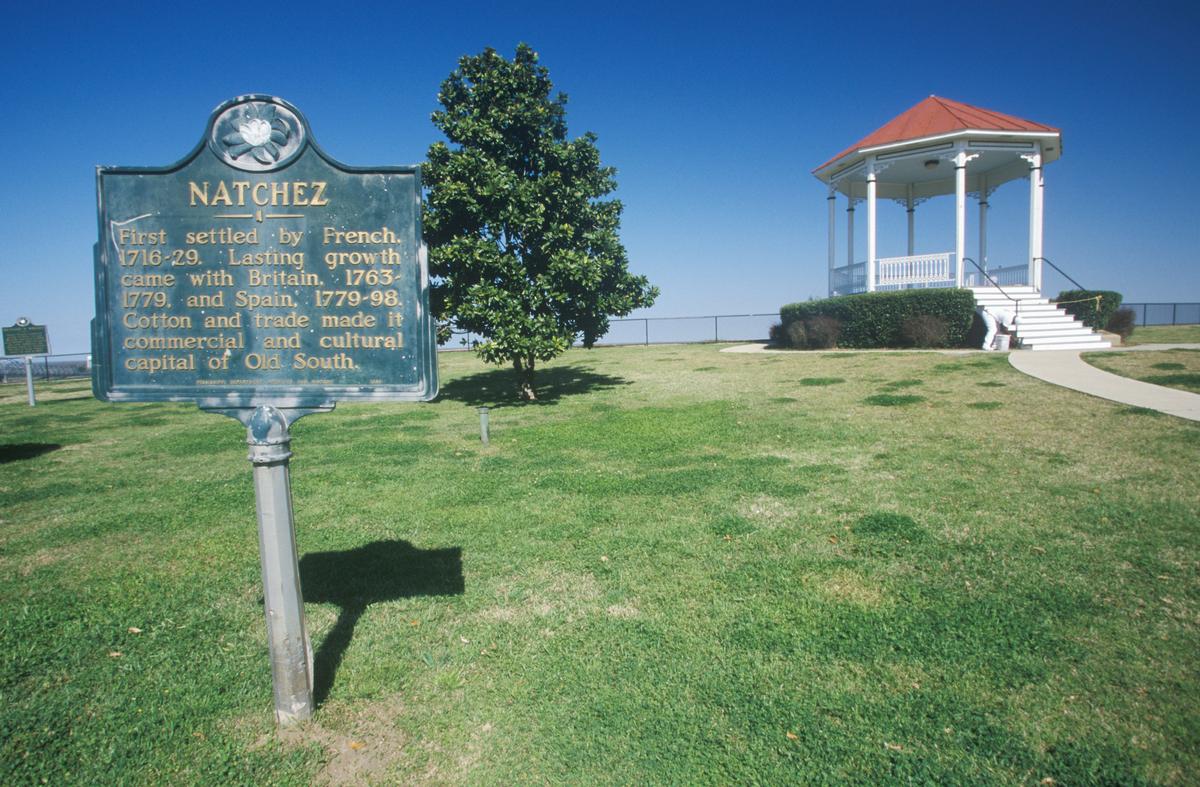 Natchez, MS sign and gazebo in roadside park overlooking MS River