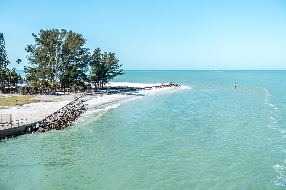 Savor seafood and enjoy soft sand on an affordable summer escape.