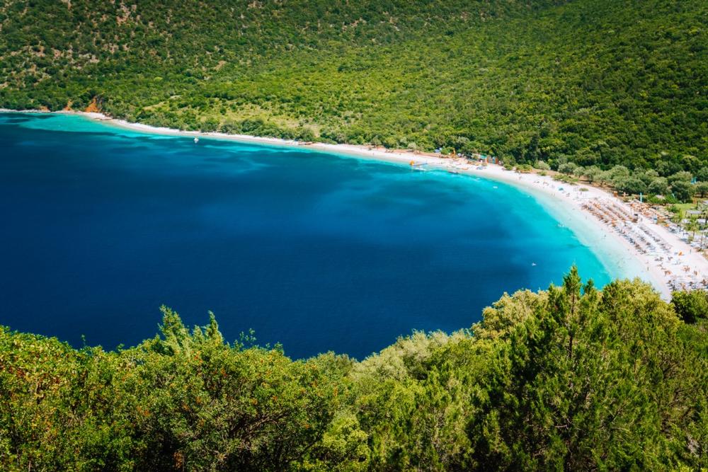 Relax on Antisamos Beach and enjoy crystal-clear waters and scenic views.