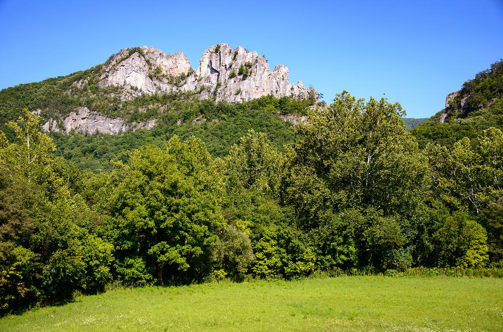 Climb dramatic rock faces and admire sweeping views on an exciting summer trip.