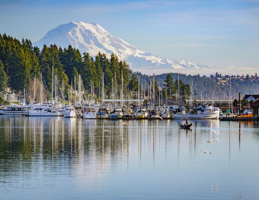 Walk along the waterfront or admire scenic marinas with mountain views.