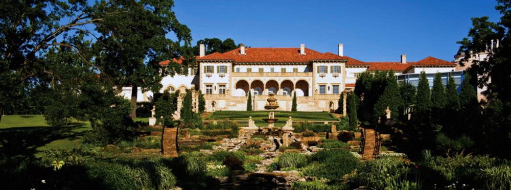 Tour Italian-style halls and enjoy romantic strolls through lush gardens.