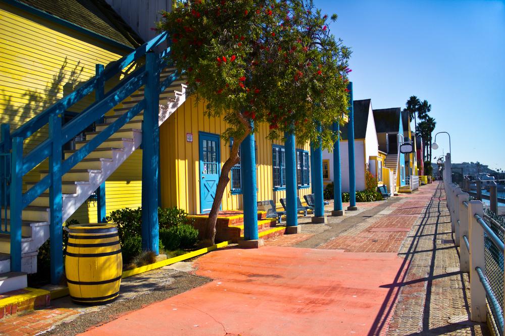 Shop, Dine, and Stroll the Colorful Waterfront at Fisherman’s Village