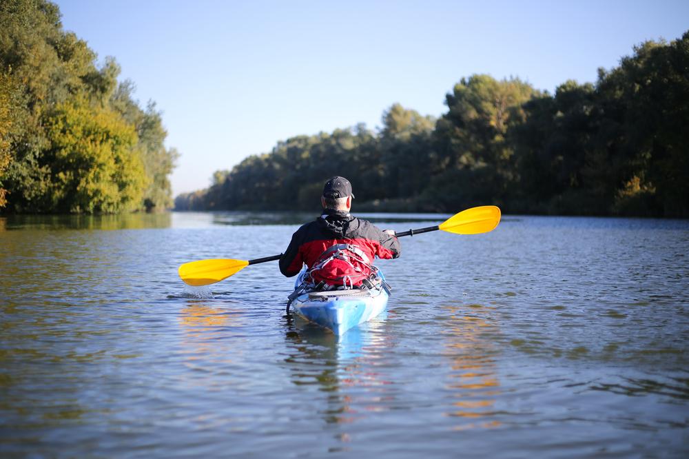 Paddle past red cliffs and enjoy an exciting river adventure.