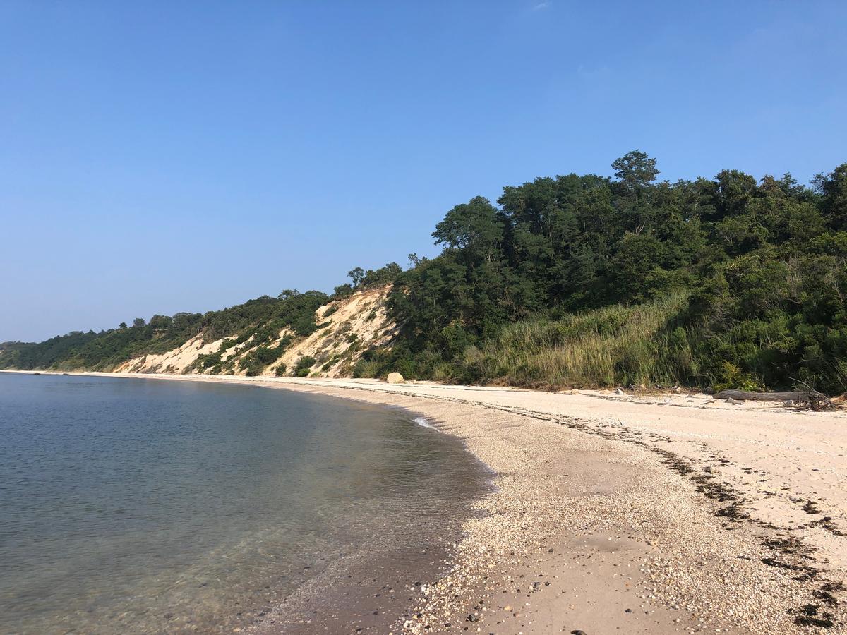 A Crescent Beach at Hallock State Park Preserve in Riverhead, Long Island, New Yor
