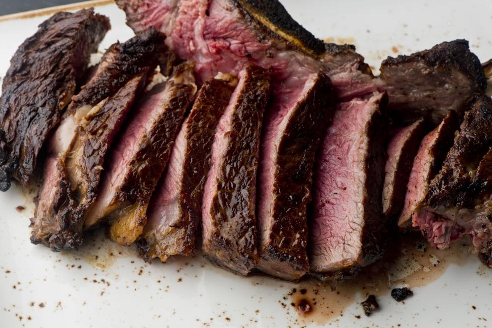 Savor Greek-style steaks and enjoy a casual dinner during a summer trip.