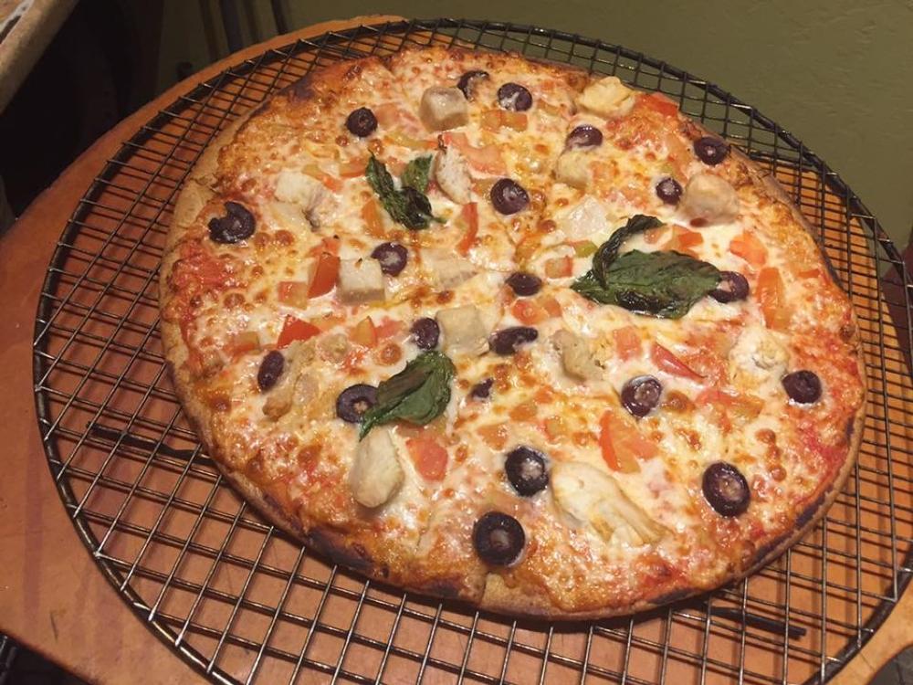 Savor wood-fired pizza and enjoy a romantic meal on the patio.