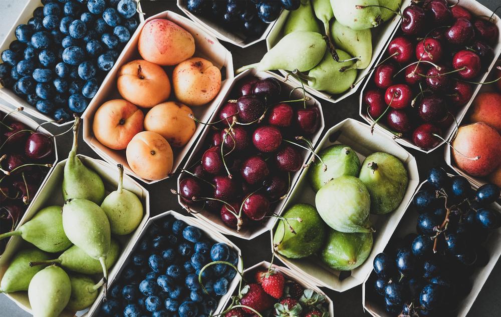 Explore fresh produce stands and sample local treats on a vibrant summer morning.