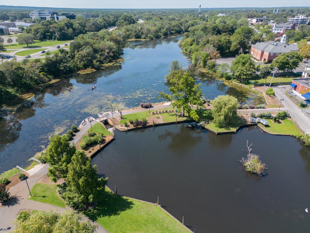 Riverhead New York located in Suffolk County on Long Island with buildings, waterway and boats