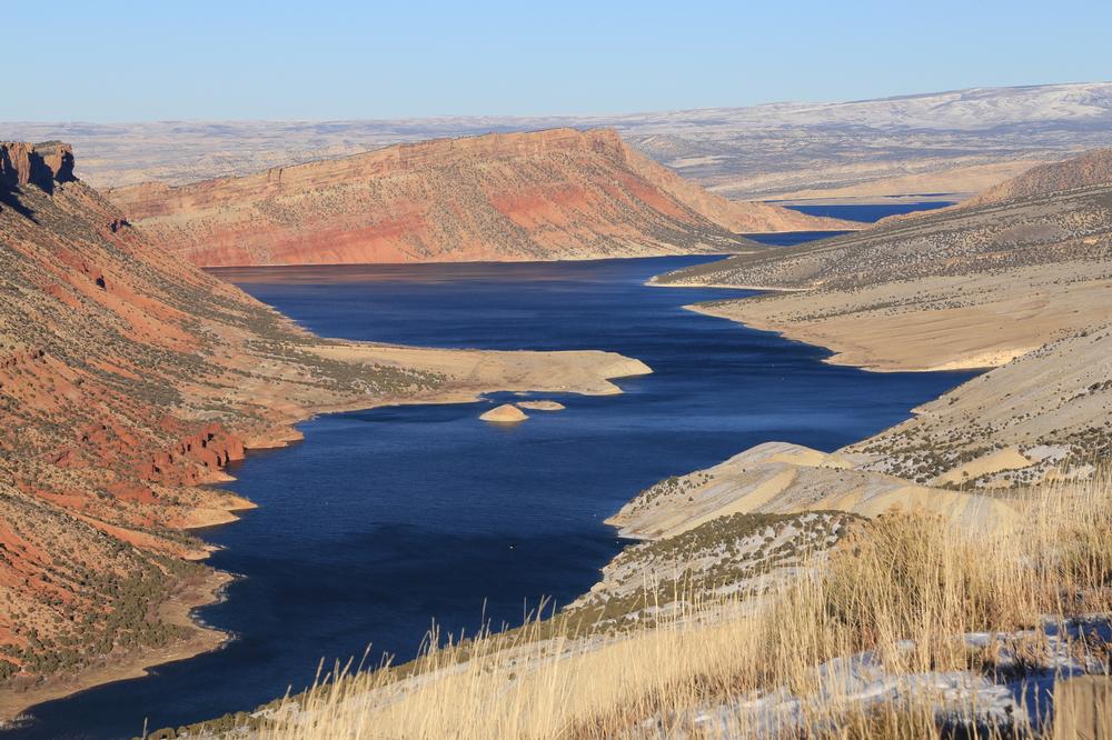 Boat through colorful cliffs and hike scenic trails on a spring adventure.