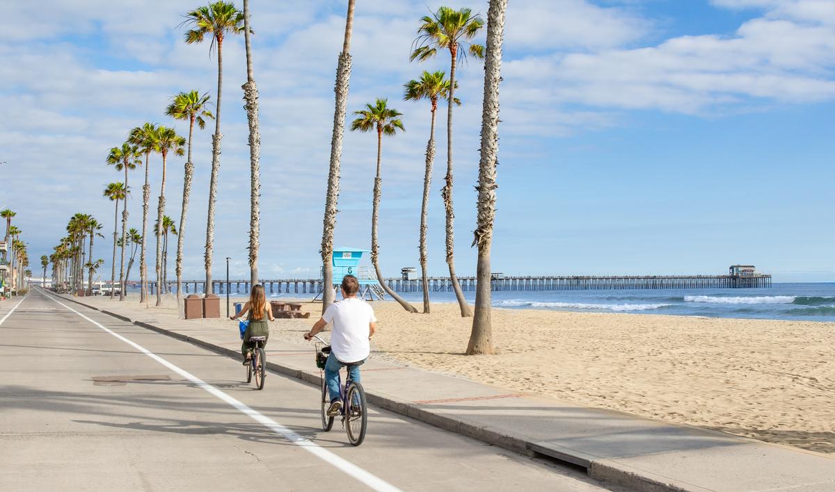 Riding bikes along the beach