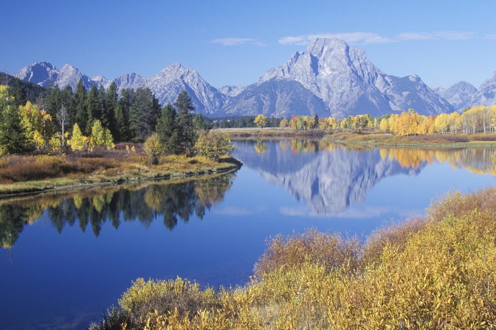 Exchange vows with iconic views of the Tetons and serene lakes.