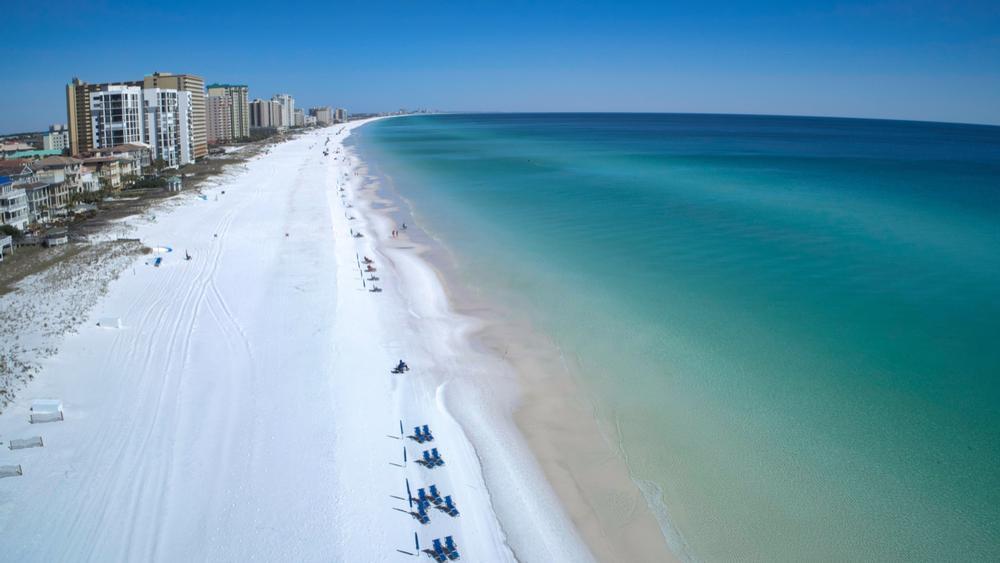 Sunbathe on white sands of Destin Beach | White Sand Beaches in Florida