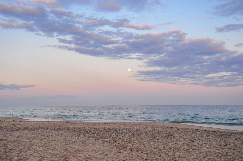 Relax on quiet sands and savor a peaceful summer trip.