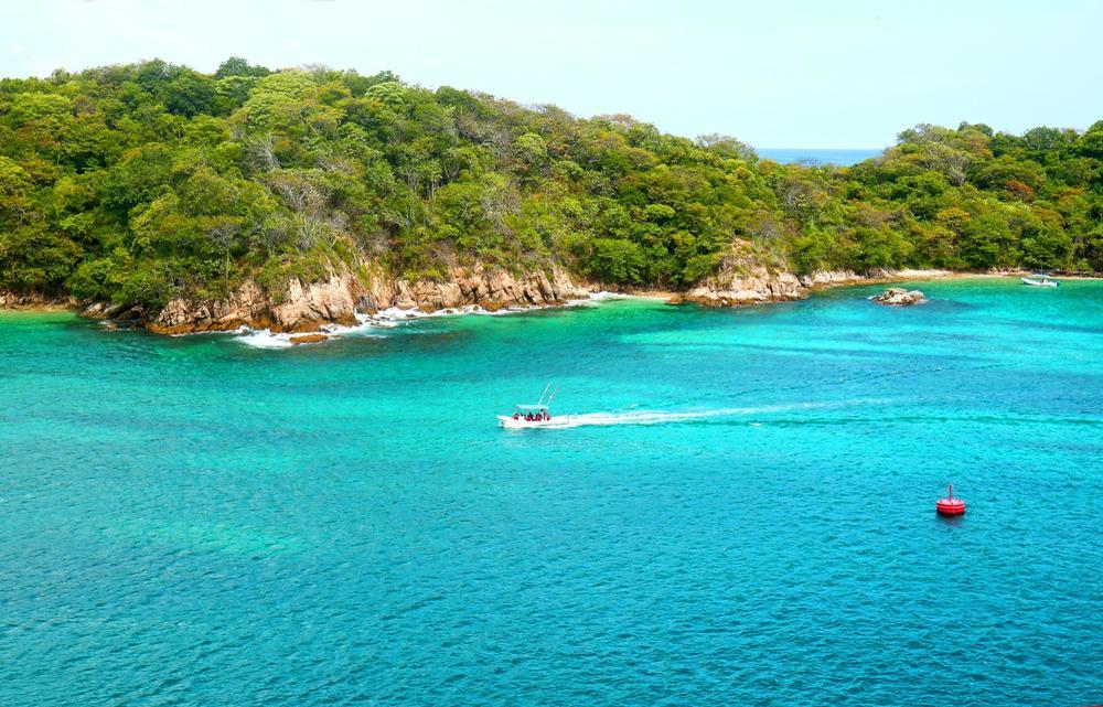 Swim in calm waters and enjoy an easy beach trip with family.