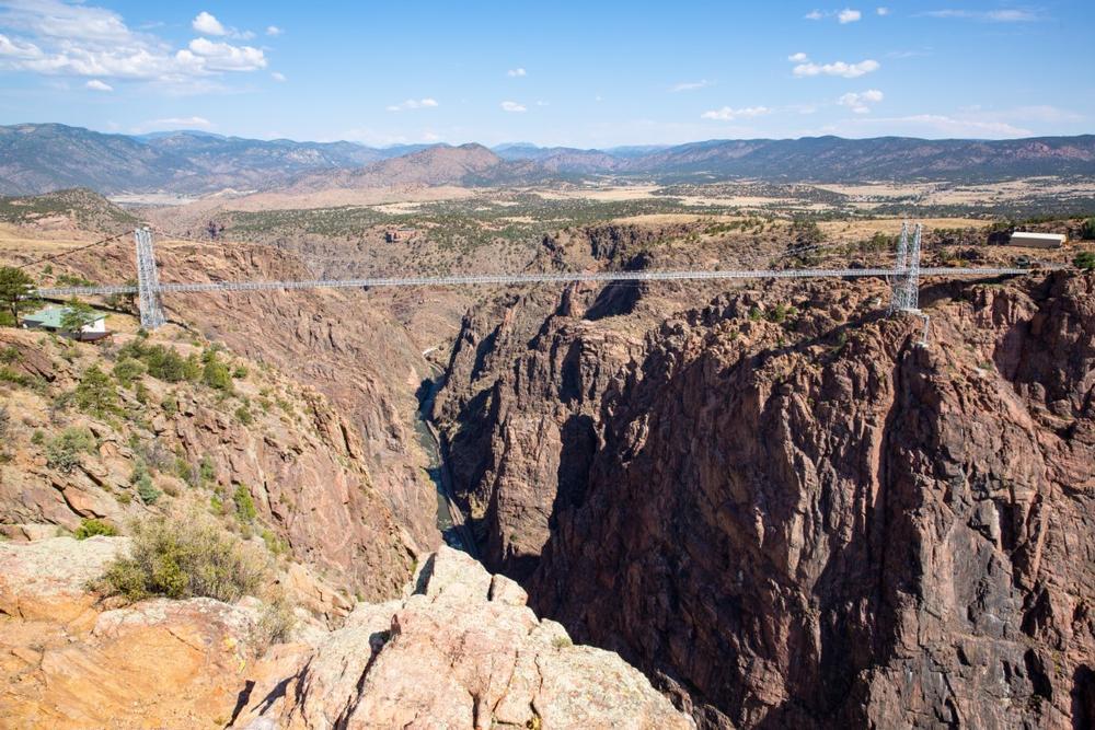 Walk across the bridge and see canyon views during a thrilling trip.