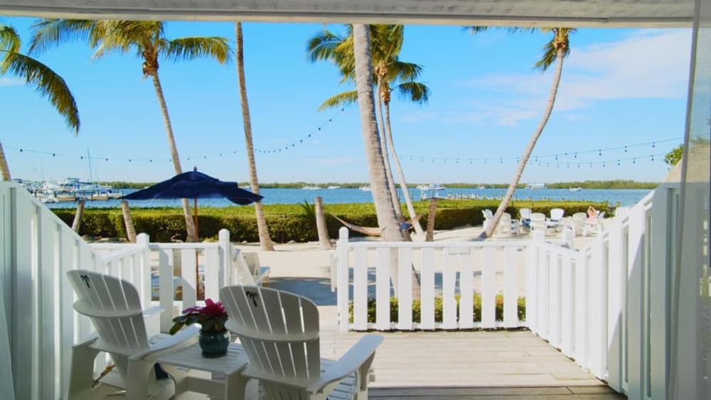 Toast the Sunset: Discover Waterfront Charm at Coconut Palm Inn