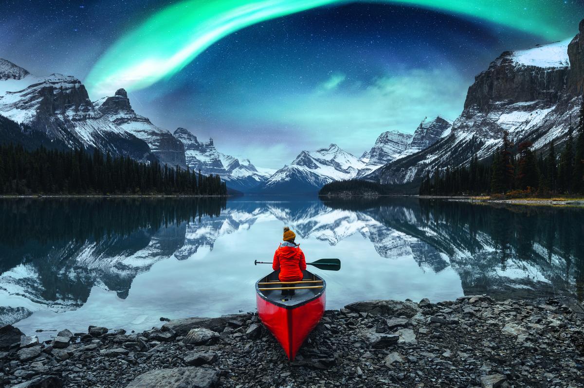 Aurora borealis over Spirit Island in Maligne lake at Jasper National Park