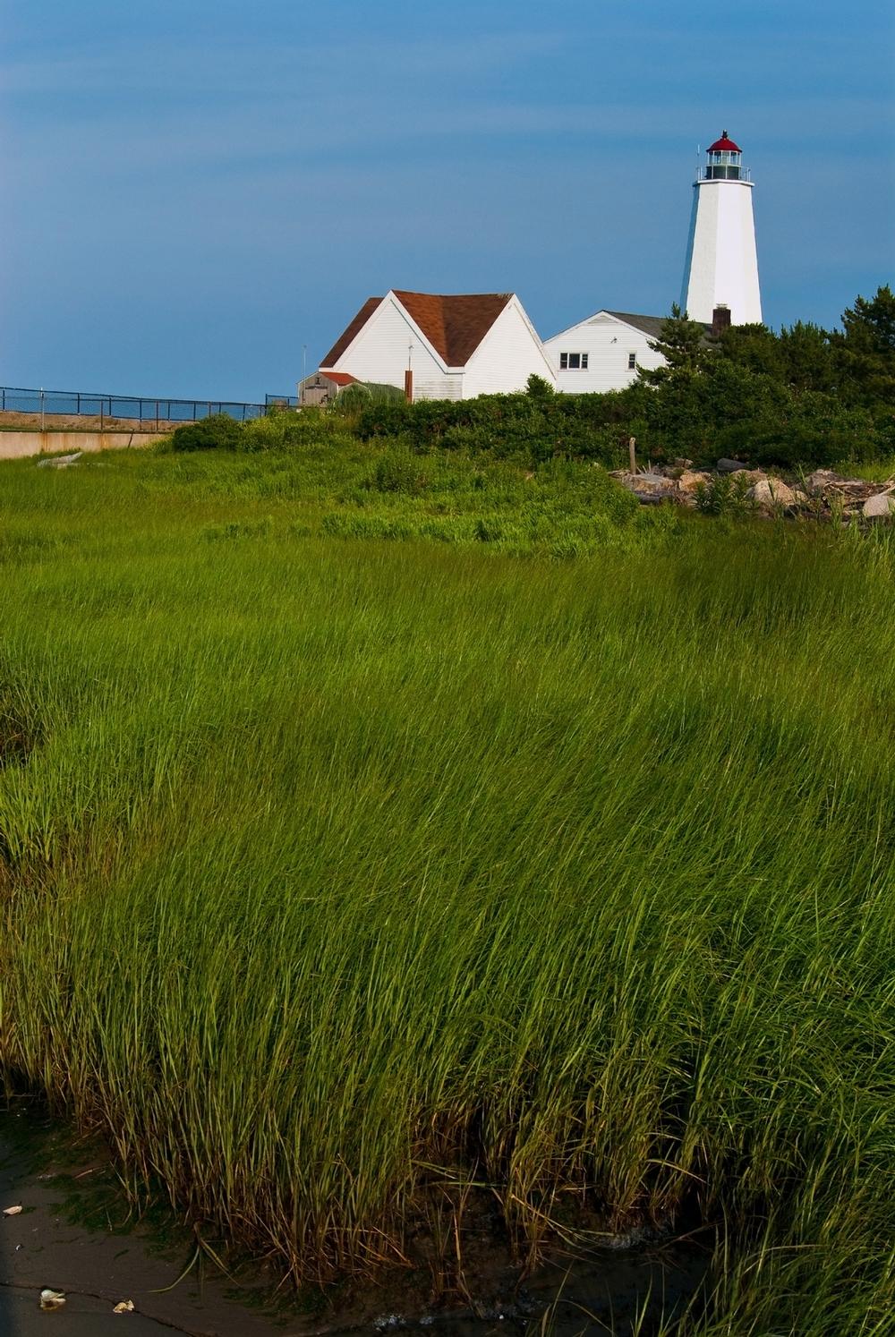 Walk along the shoreline and admire charming coastal sights.