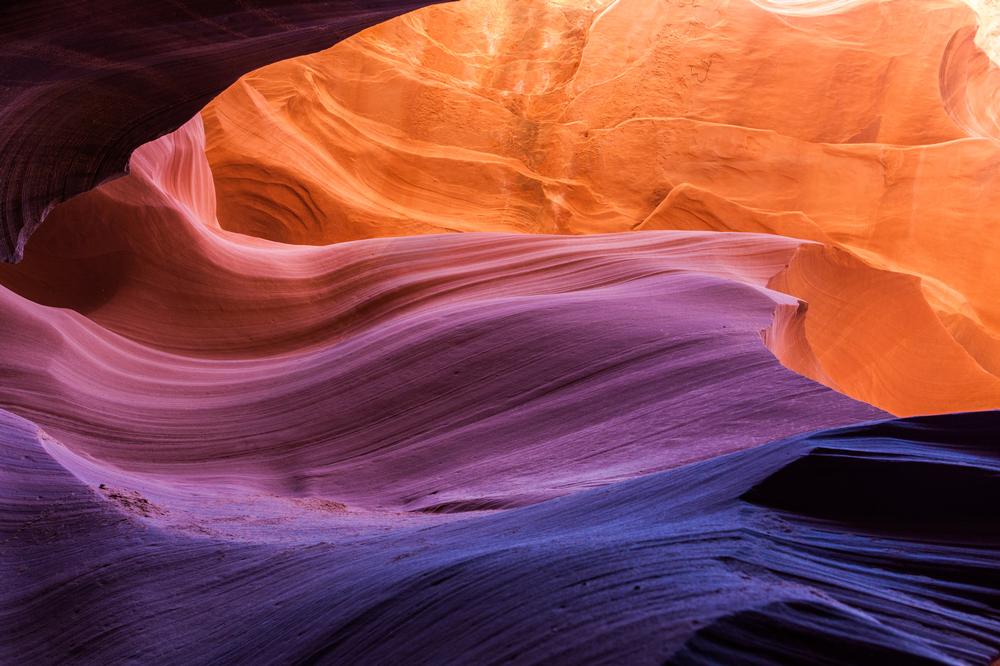 Explore narrow slots and photograph stunning light beams on an unusual adventure.