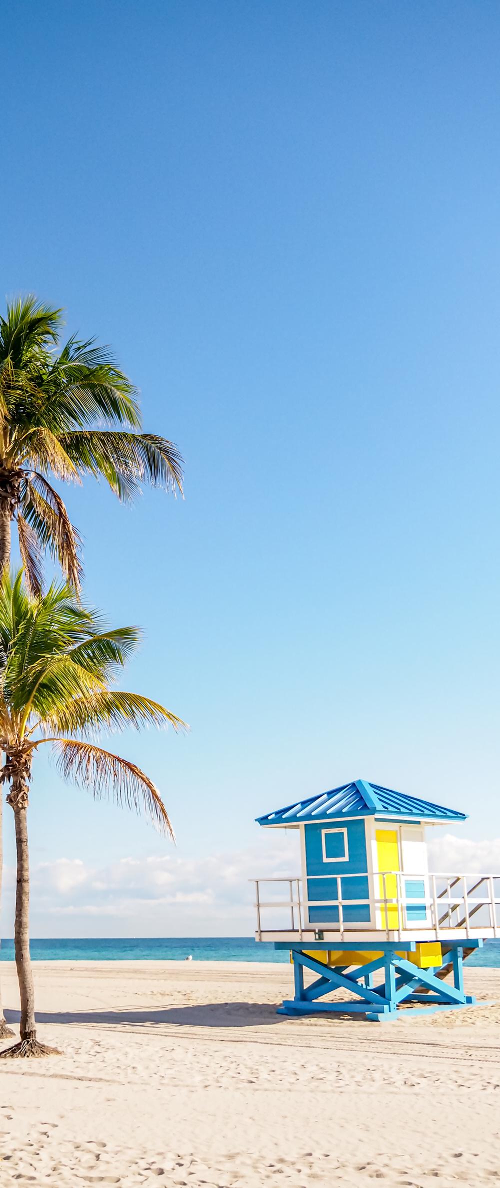 Sandy beach with lifeguard hut