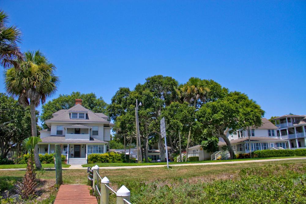 Watch dolphins and unwind on a peaceful waterfront couples retreat.