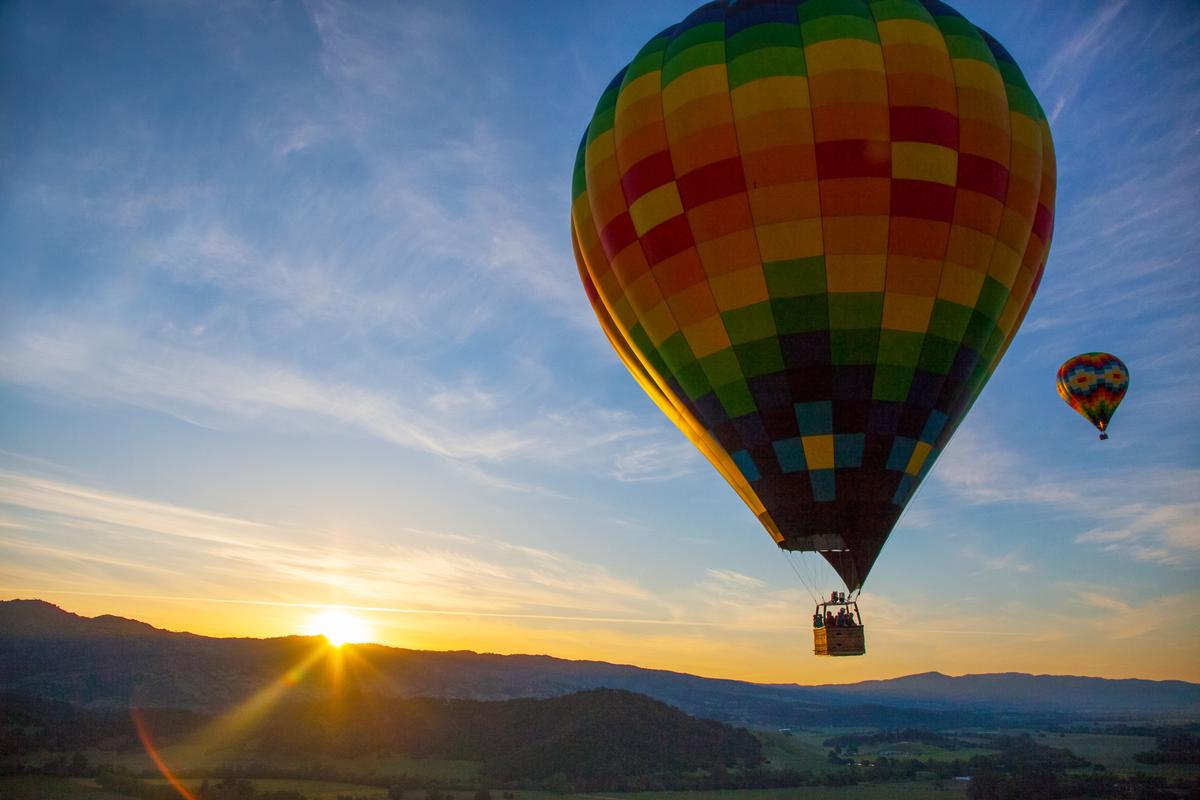 Hot Air Balloon Over Vineyards in Napa