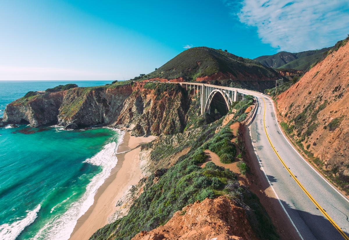 Driving along Highway 1 near a beach