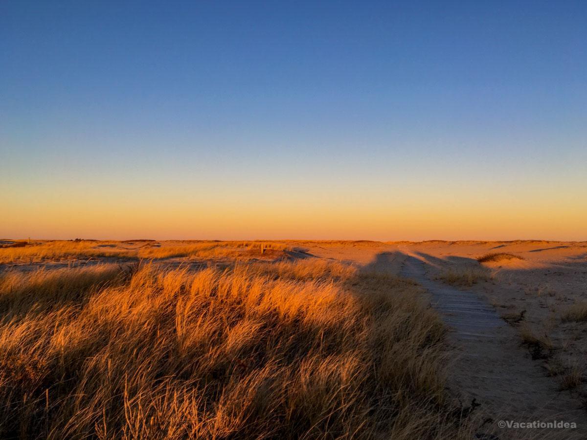 I took this photo of a sunset over the dunes