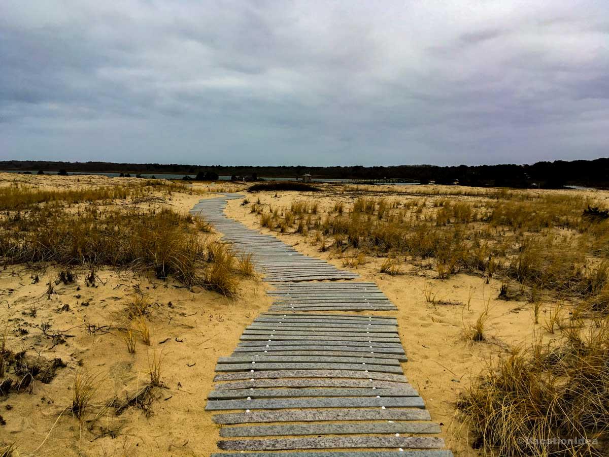 I took this photo of a boardwalk over the sand on a stormy day
