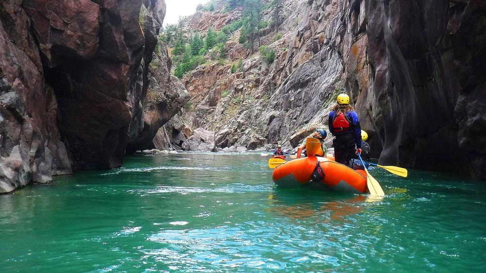 Paddle Through Rapids With Mountain Waters Rafting