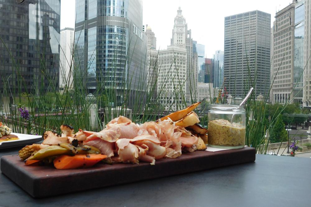 Soak in Skyline Views with Style at Raised