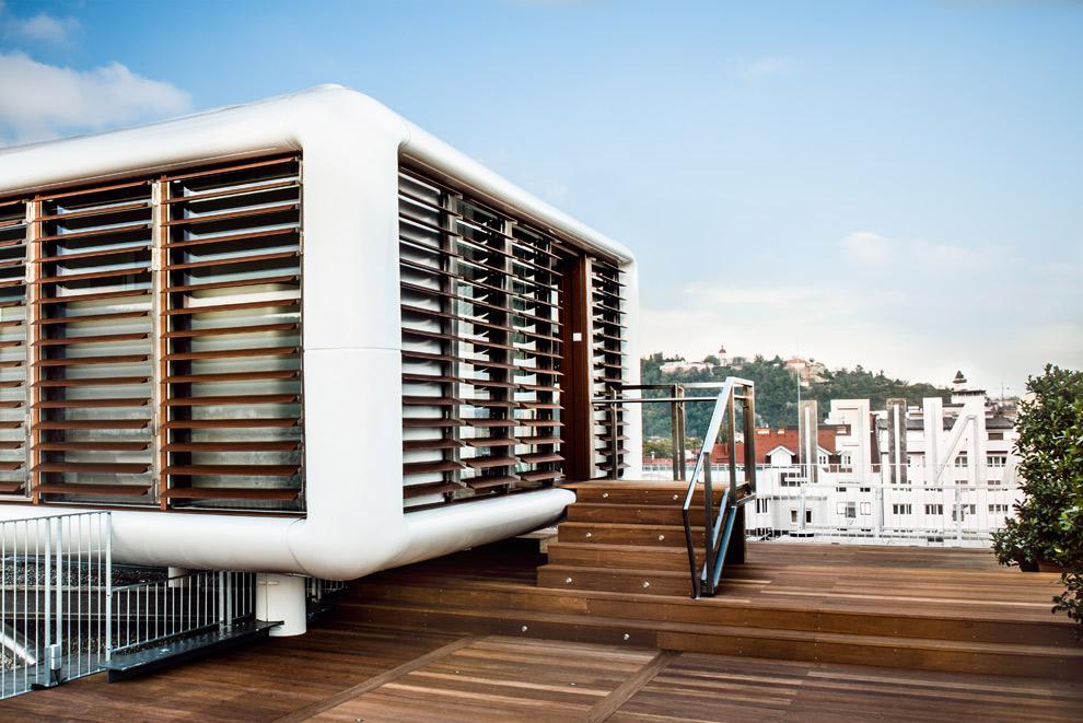 Relax in a unique rooftop suite with breathtaking city views.
