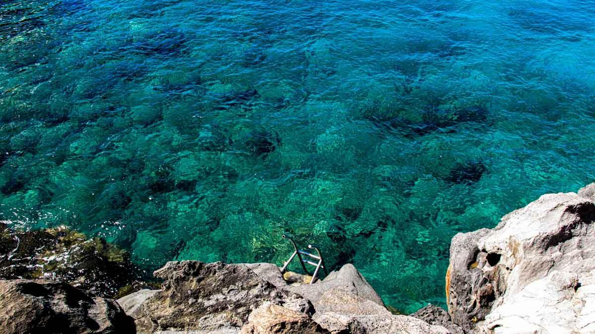 I took this photo of the ladder leading down to the sea, inviting me to cool off in Croatia