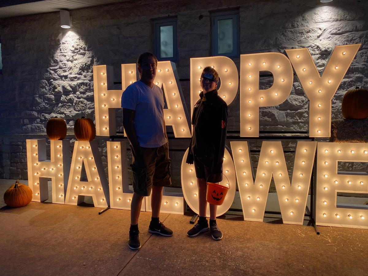 I took this photo of my husband and son on the Trick-or-Treat Trail