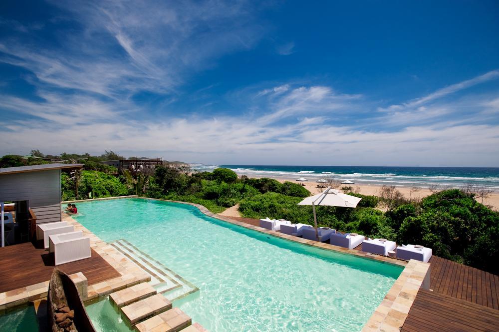 Lounge in oceanfront suites and savor seafood on a romantic coastal escape.
