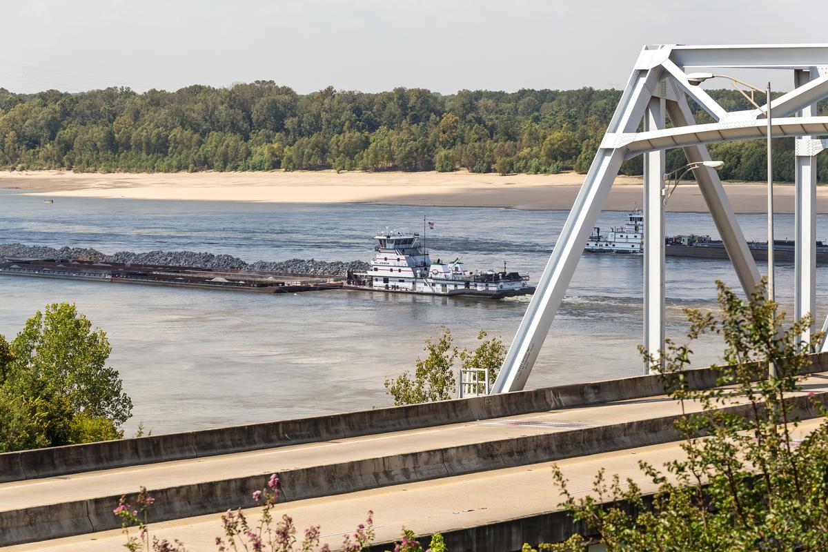 Barges Passing Beneath Mississippi River Bridge at Natchez MS