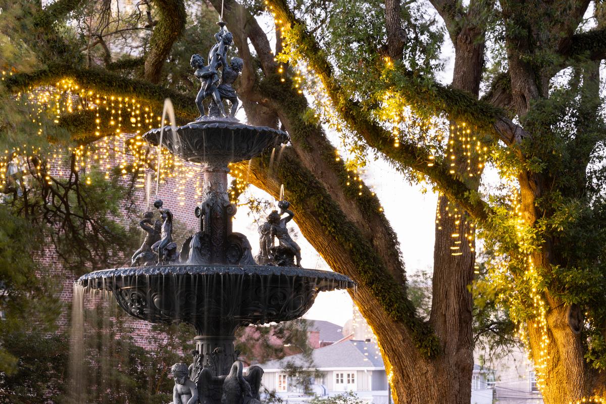 Water cascades down a historic fountain in downtown Natchez
